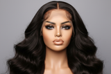 Realistic 30” body wave 4x4 unit on mannequin with beat face and plump lips